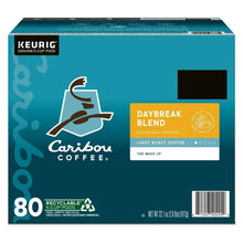 K-Cup coffee box front with teal Caribou Coffee logo, Daybreak Blend label, and 80 pods.