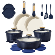 Blue ceramic cookware set with detachable handles and lids, plus matching silicone utensils.