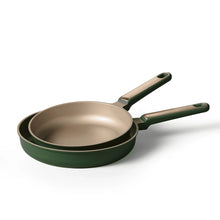 Green nonstick frying pan set with two stacked skillets and side handles
