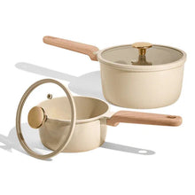 Cream ceramic nonstick saucepan with lid and wood-look handle, small cooking pot