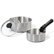 Stainless steel saucepan with black detachable handle and glass lid
