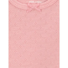 Pink knit baby bodysuit with textured fabric, bow at neckline, and snap placket