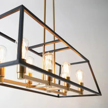 Long pendant light angled view with black frame and warm glowing clear glass bulbs
