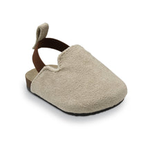 Tan suede infant slip-on clogs with cushioned strap and closed toe