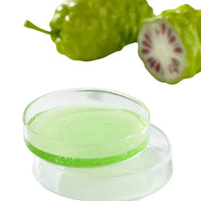 Noni ampoule serum gel in clear jar with noni fruit piece