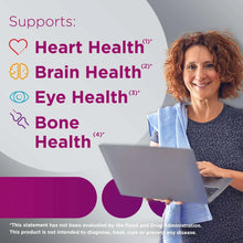 Older woman smiling while holding a laptop, with heart, brain, eye, and bone icons