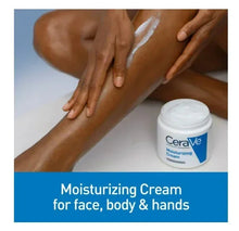 CeraVe Moisturizing Cream jar with white lid near hands