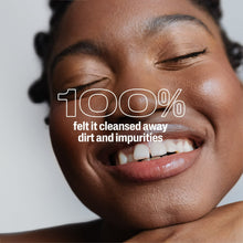 Facial cleanser used on a smiling face, '100%' text over the image