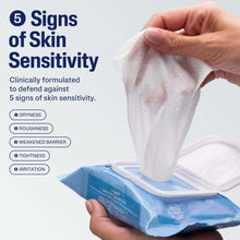 Facial cleansing cloths packet with one wipe lifted, for sensitive-skin cleansing