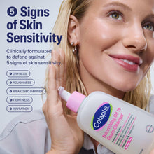 Nourishing oil-to-foam facial cleanser bottle with pink pump beside face