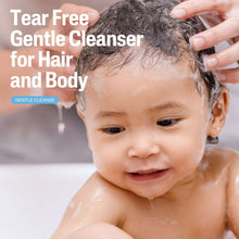 Baby getting tear-free gentle cleanser for hair and body, hand near scalp