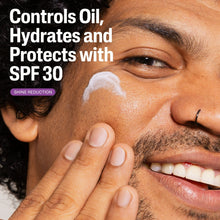 Hands applying moisturizer cream near eye area on face