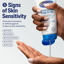 Cetaphil Extra Gentle Daily Scrub tube held in a hand with 5 signs of sensitivity