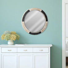 Round wood mirror with black textured rim and silver reflective glass, 30-in size