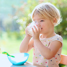 Nonfat dry milk in a child's cup
