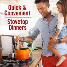 Chef Boyardee Beefaroni can on kitchen counter beside stovetop pot