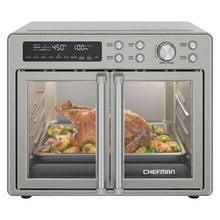 Stainless steel French-door toaster oven air fryer with two rack compartments and food inside