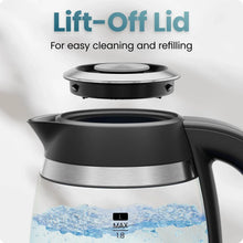 Black electric kettle with open lift-off lid showing top heating area