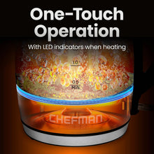 Black electric kettle with illuminated heating base and water level indicator