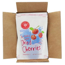 Cardboard shipping box open with white pouch of no-added-sugar dried cherries