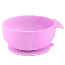 Pink silicone feeding bowl with wide rim and attached drip base