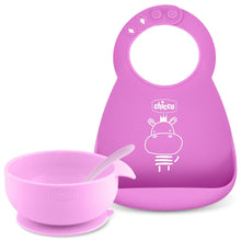 Pink silicone baby bib with bunny graphic and matching feeding bowl