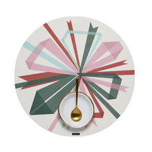 Round woven placemat with multicolor bowburst geometric design on light background
