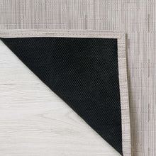 Chilewich woven willow rug edge, light gray top with dark charcoal underside