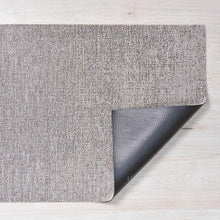 Chilewich shag indoor/outdoor mat corner, light gray, textured surface