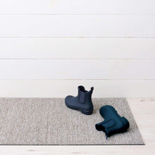 Chilewich shag indoor/outdoor mat, light gray, with raised texture