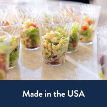 Clear crystal plastic cups filled with salad and chopped toppings