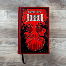 Hardcover horror book, red and black cover with large 'Classic Tales of Horror' lettering