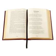 Hardcover horror book, open pages with printed text and a large right-page heading