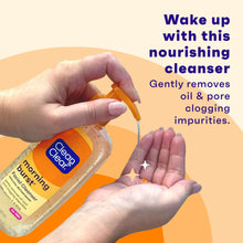 Facial cleanser bottle with pump being squeezed into a hand.