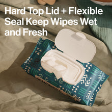 Wipe pouch with hard top lid open, white wipes inside