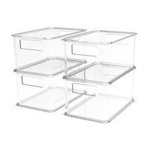 Clear plastic organizing bin set with four rectangular bins, open lids