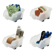 White stacking storage bins with assorted contents: green fabric, brown cups, brushes, blue tools.