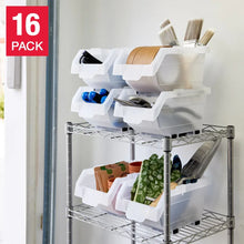 White stacking storage bins with dividers on a metal rack, arranged in tiers.