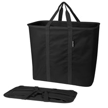 Foldable black laundry caddy tote with two side panels and carry handles