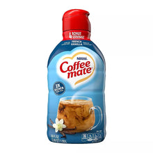 Coffee-mate French vanilla creamer bottle, blue with red cap, front view.