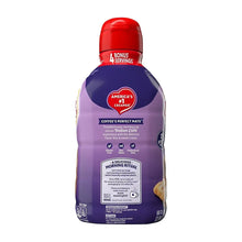 Italian sweet creme coffee creamer bottle, purple with red cap, back label view