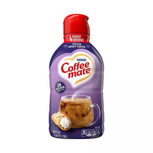 Coffee Mate creamer bottle, purple with red cap and Coffee mate logo, front view