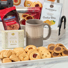 Coffee tray gift set with gray mug, cookies, tea bags, and boxed cookie assortments