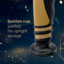 Kids manual toothbrush with black suction-cup base for upright storage