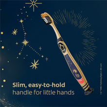 Slim kids manual toothbrush with star-themed handle and extra-soft bristles
