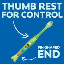 Kids toothbrush with green fin-shaped end and soft bristles for gentle control