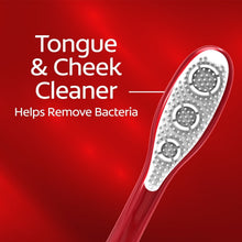 Manual toothbrush with tongue and cheek cleaning bristles on red handle.