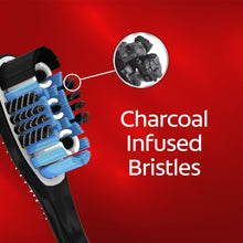 Charcoal-infused bristle manual toothbrush with black handle and blue bristle details.