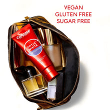 Colgate Optic White Advanced toothpaste tube in zip pouch with bottles and case
