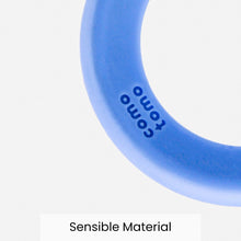 Blue crescent silicone baby teether with raised text on the curved edge